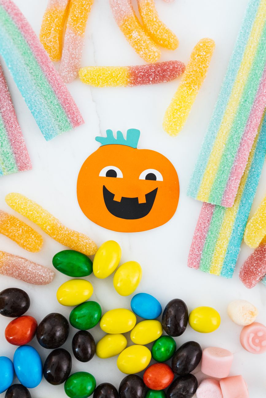 pumpkin cutout among sweets